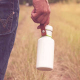 Drinking bottle made of stainless steel white BPA-free in retro style vegan